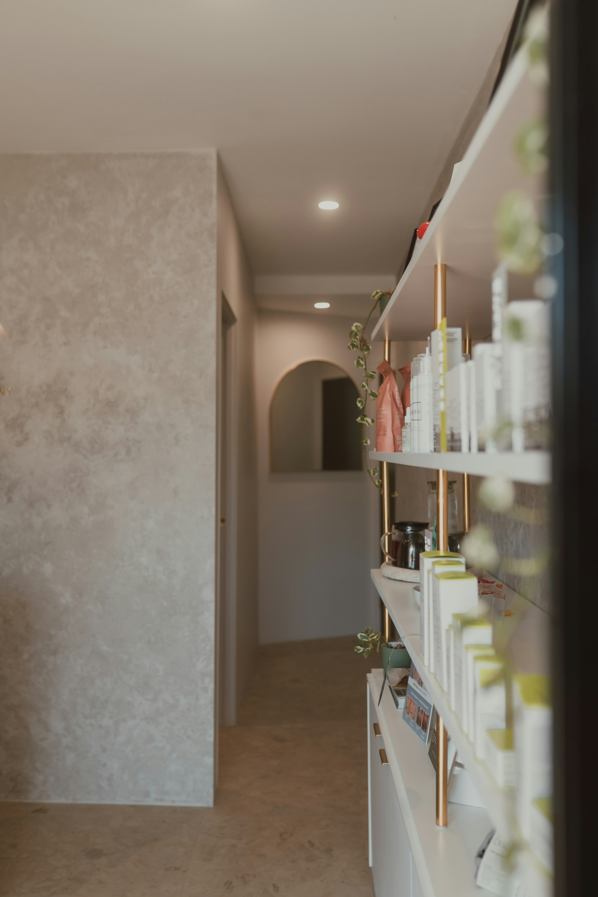 A quiet hallway leading to the treatment rooms at Luméra Clinic