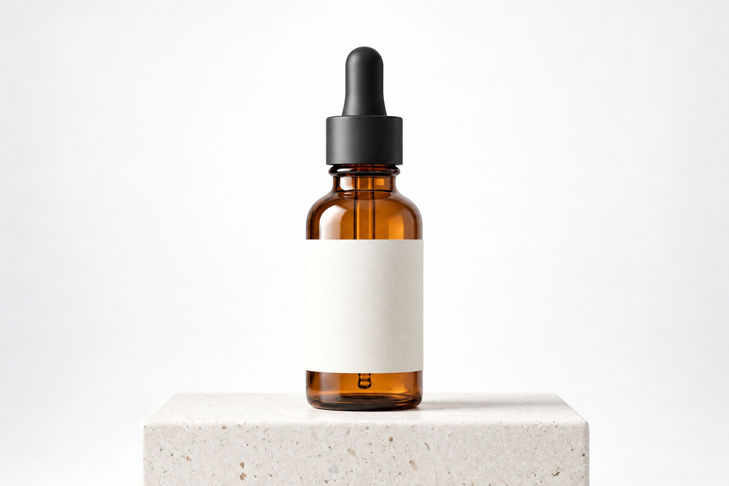 An amber glass dropper bottle